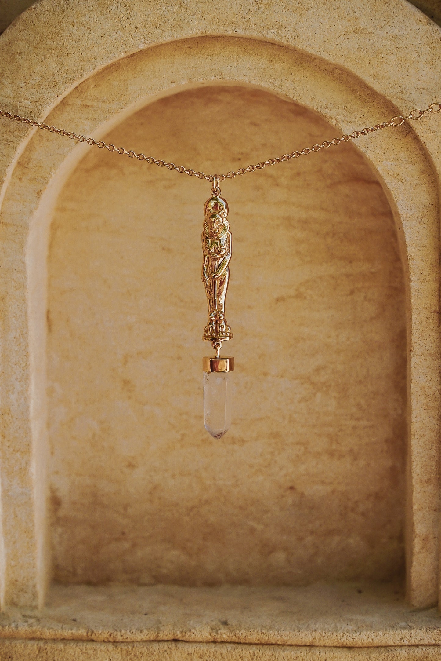 Gold Plaited Sekhmet with quartz crystal .....